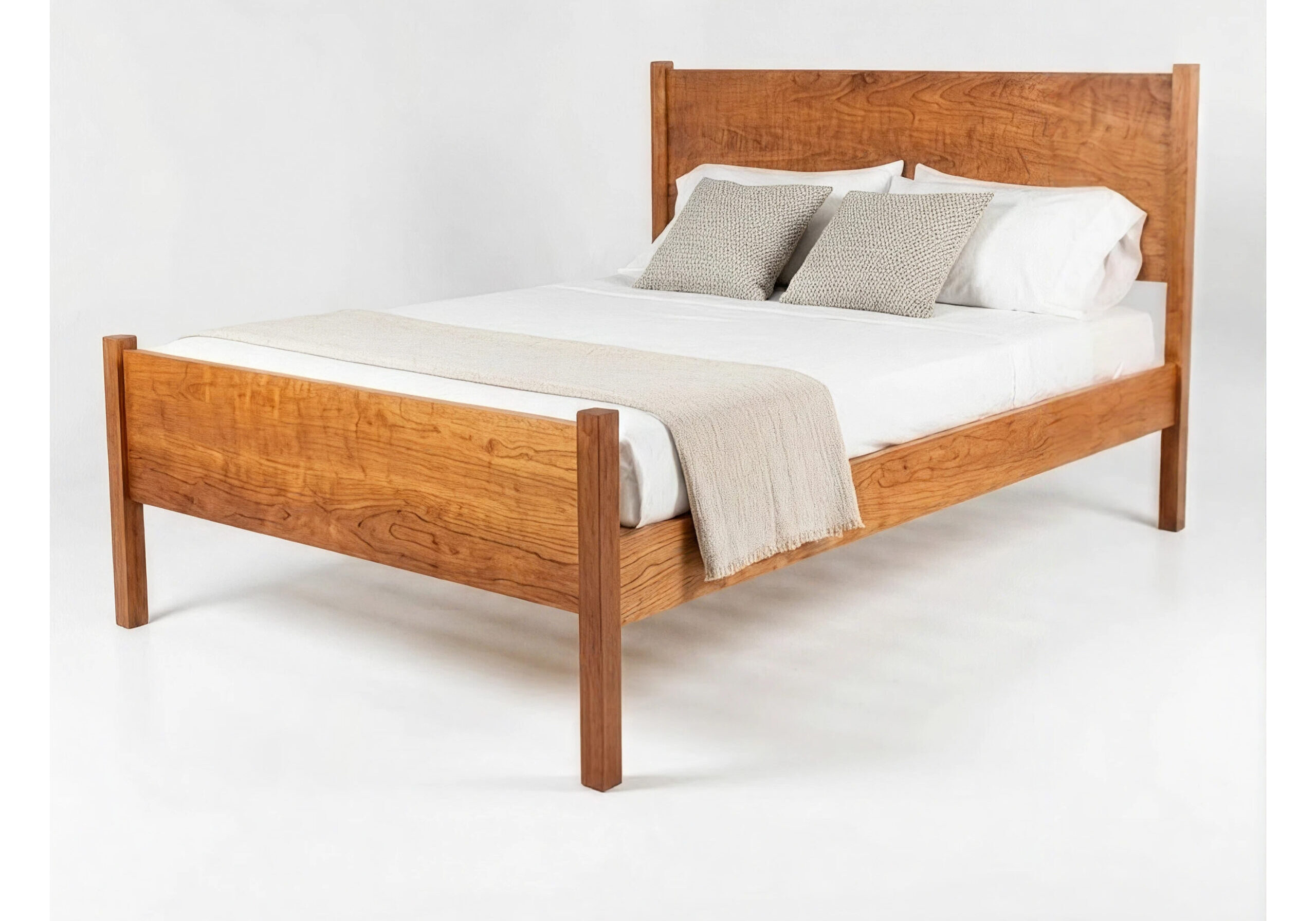 Bed frame named Hayden - shown with minimal white bedding